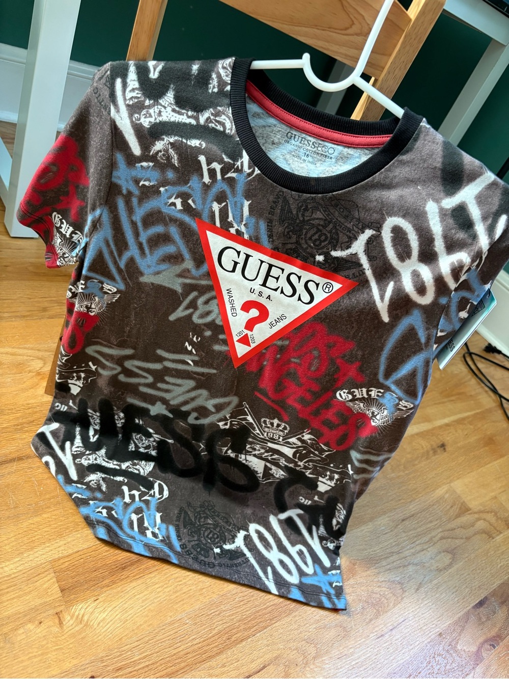 GUESS Brown Multi Logo Graphic Tee with Red & Blue Accents
